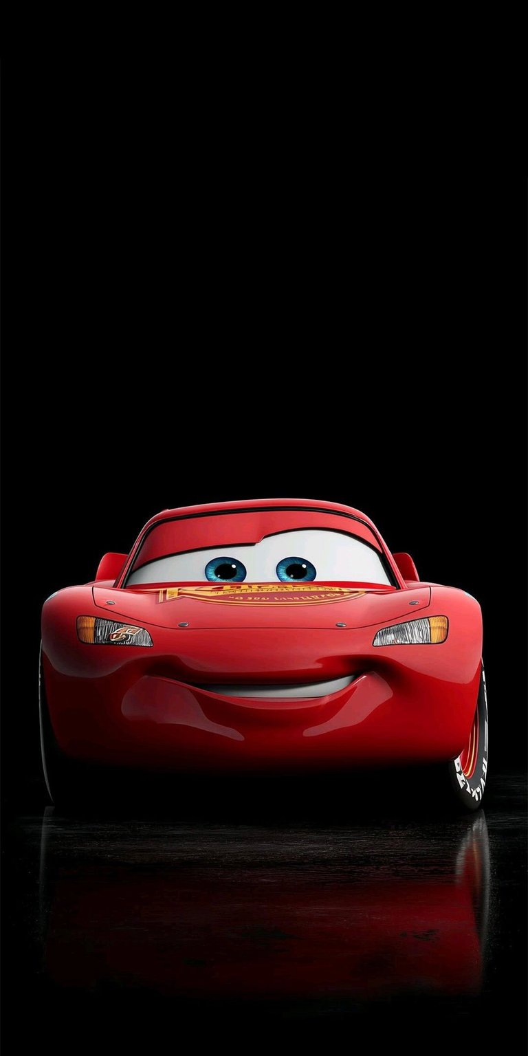 Get this Lightning McQueen 4K wallpaper for your iPhone! This stunning wallpaper features the front view of a red car with bright blue eyes and its reflection on a dark surface.