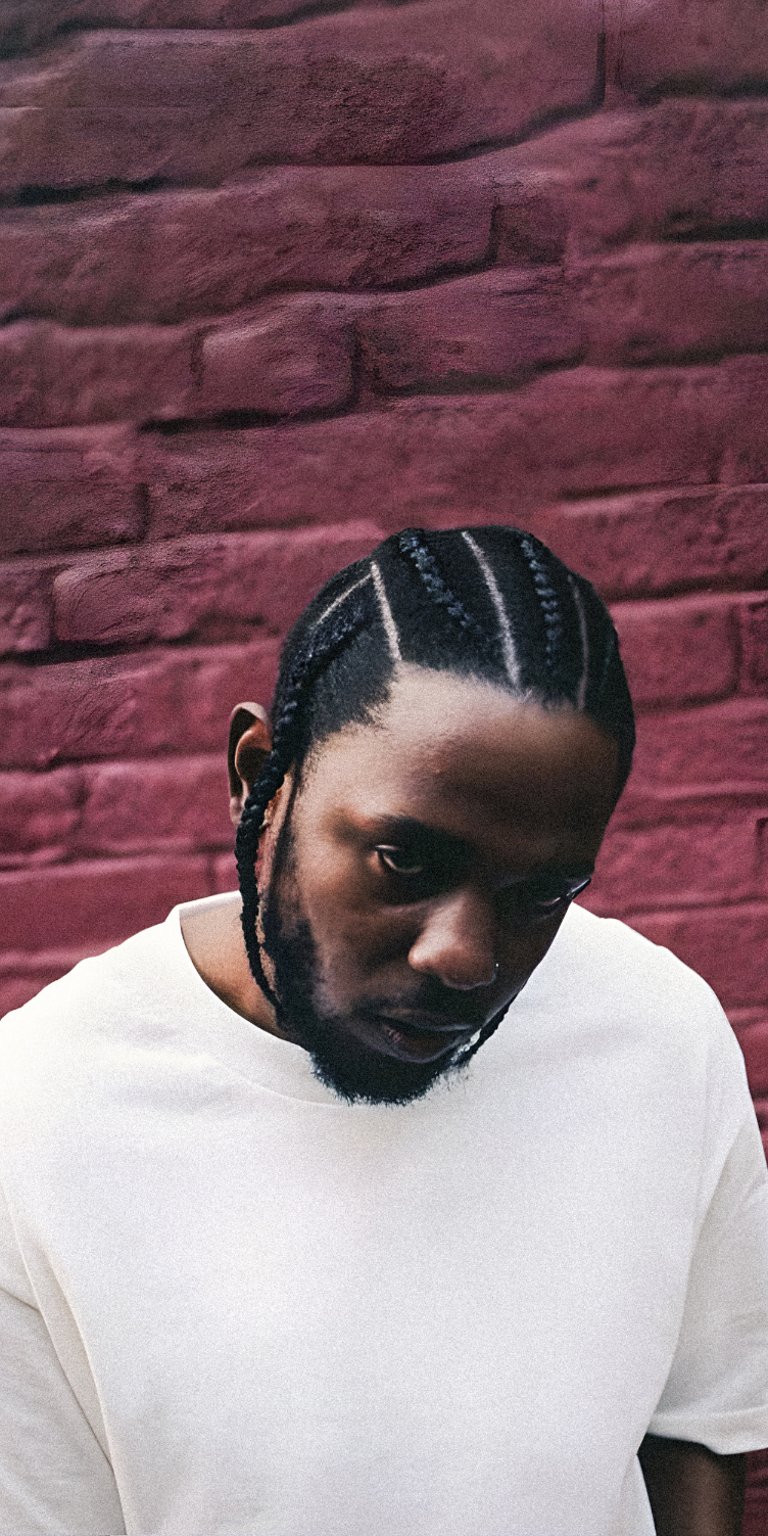 Kendrick wearing a white shirt wallpaper