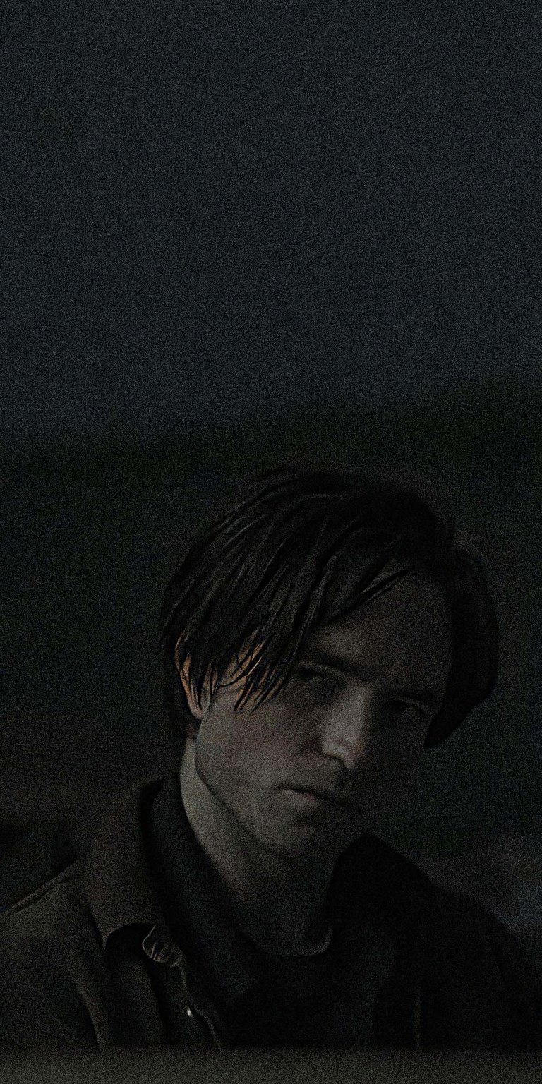 A raw and emotional look at Robert Pattinson as the unmasked Bruce Wayne. With smudged eye makeup and disheveled hair, this wallpaper captures the toll that being Batman takes on the man behind the mask. A must-have for fans who prefer the character-driven, darker side of the DC universe.