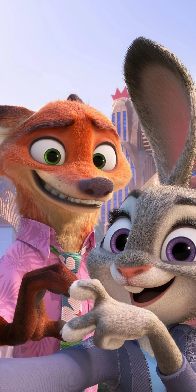 Download this adorable Judy and Nick 4K wallpaper for your iPhone! This wallpaper features Judy Hopps and Nick Wilde smiling and making a heart with their hands against a backdrop of Zootopia.