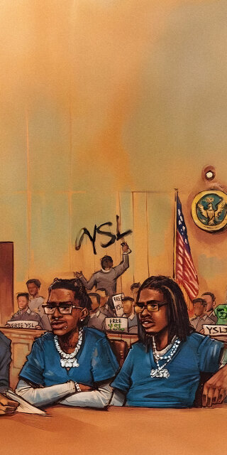 Young Thug and Gunna sitting beside each other painting wallpapers