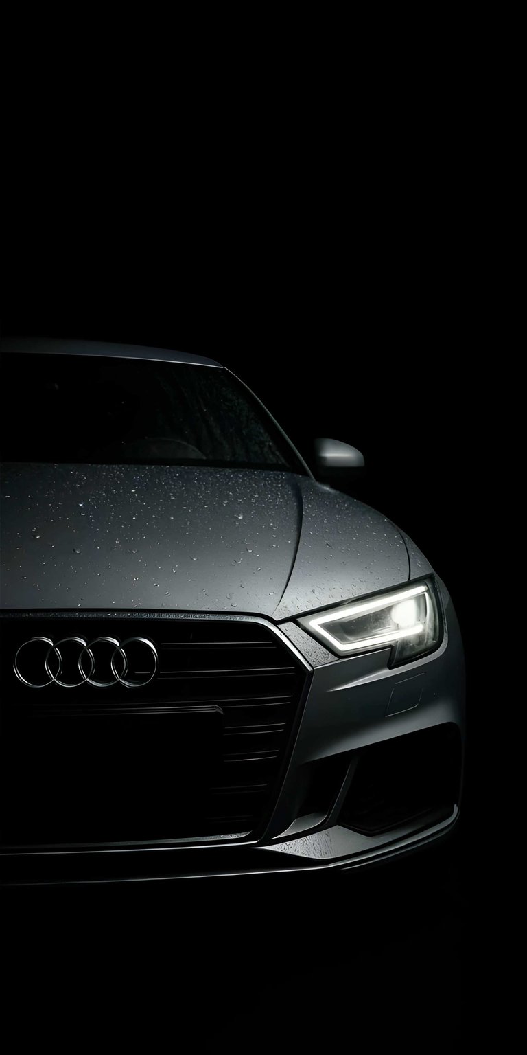 This high-contrast Audi A3 Sedan 4K wallpaper is optimized for iPhone displays featuring deep blacks and sharp highlights. The minimalist OLED / AMOLED wallpaper showcases the iconic LED headlights and grille of the vehicle in a sophisticated, moody setting.