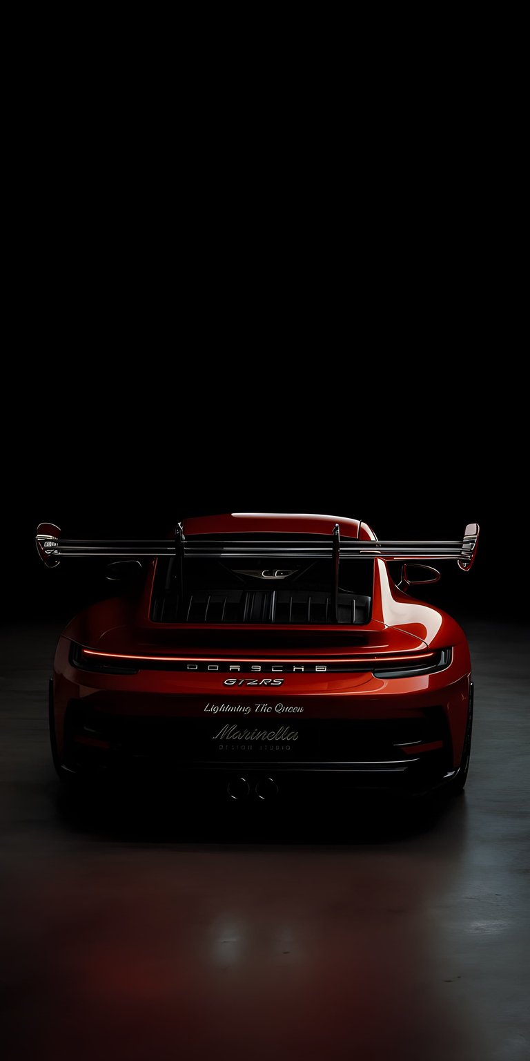 This stunning Porsche GT3RS 4K wallpaper is perfect for your iPhone, showcasing the car's sleek red finish, aerodynamic wing, and 'Marinella' script. Enhance your mobile device with this incredible wallpaper.