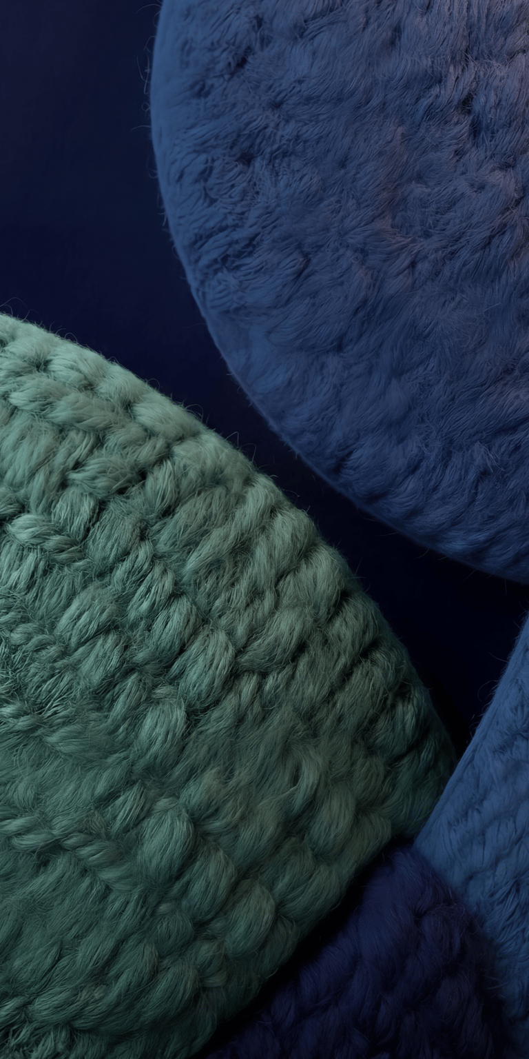 This fuzzy wallpaper features the cool texture of interlocking green and blue fibers. Set this 4K wallpaper as your iPhone background for a soft and cozy feel.