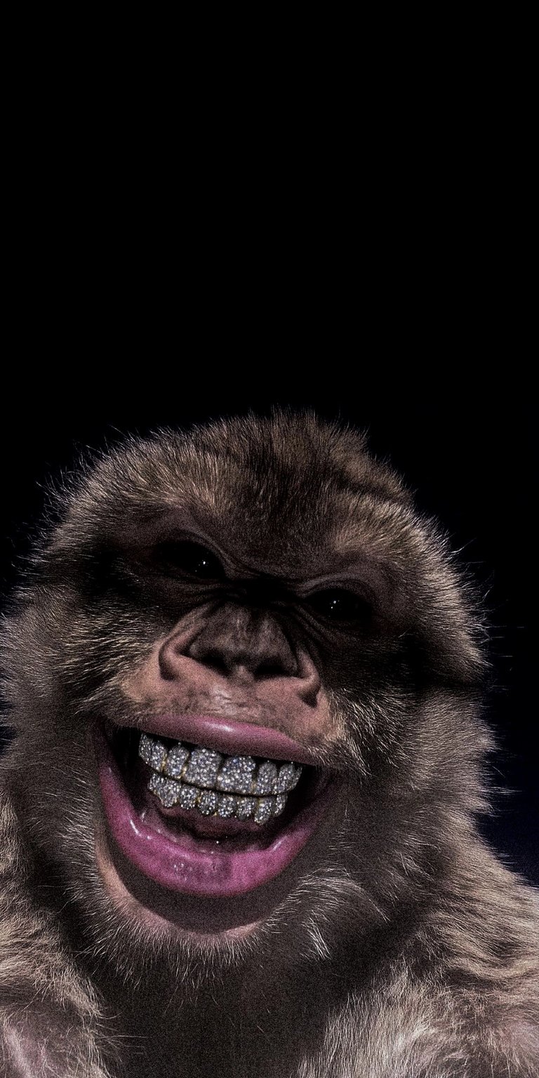 A bold and humorous "streetwear aesthetic" wallpaper featuring a close-up of a monkey flashing a diamond-encrusted grill. The high-contrast black background makes the jewelry pop, perfect for users who enjoy edgy, meme-culture, or hypebeast-inspired digital art.