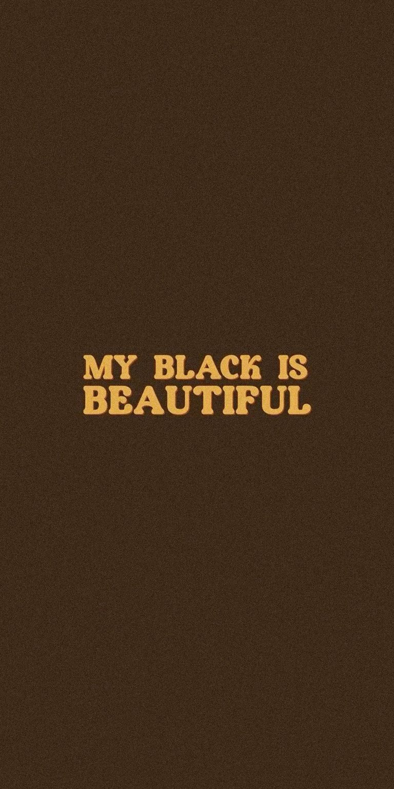 A clean minimalist wallpaper featuring "My Black Is Beautiful" text on a dark brown background. This aesthetic wallpaper offers a sophisticated look for your iPhone.