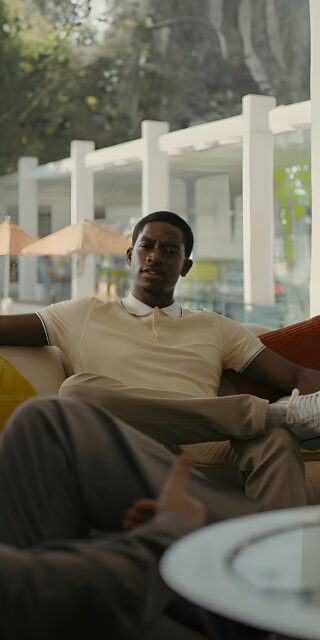 Franklin Saint all white sitting on the couch wallpapers