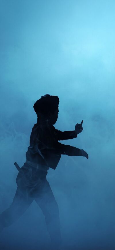 This iPhone wallpaper features a dark Pennywise wallpaper in stunning 4K resolution for your phone. This matching wallpaper shows Pennywise and another man and is intended for 2 people, creating a unique matching aesthetic across devices.