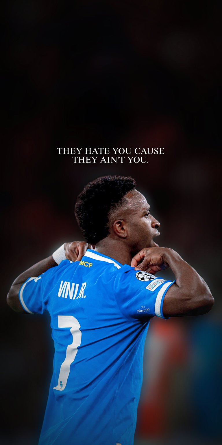 Vinicius Jr 4K Wallpaper captures the football star in a blue kit with dramatic stadium lighting and confident pose. This aesthetic wallpaper looks powerful on iPhone, making the wallpaper perfect for lock screen and home screen.