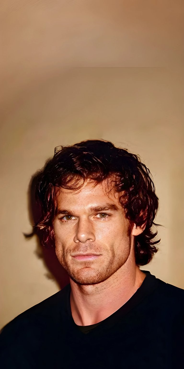 This 4K wallpaper features Dexter Morgan with his distinct curly hair and stubble. Install this striking wallpaper on your iPhone to showcase this actor.