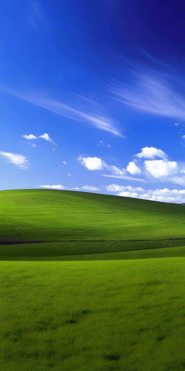 Bring the iconic Bliss landscape to your iPhone with this vibrant 4K wallpaper. This wallpaper features a vivid green hill under a bright blue sky dotted with wispy cirrus clouds, offering a nostalgic yet crisp visual experience.