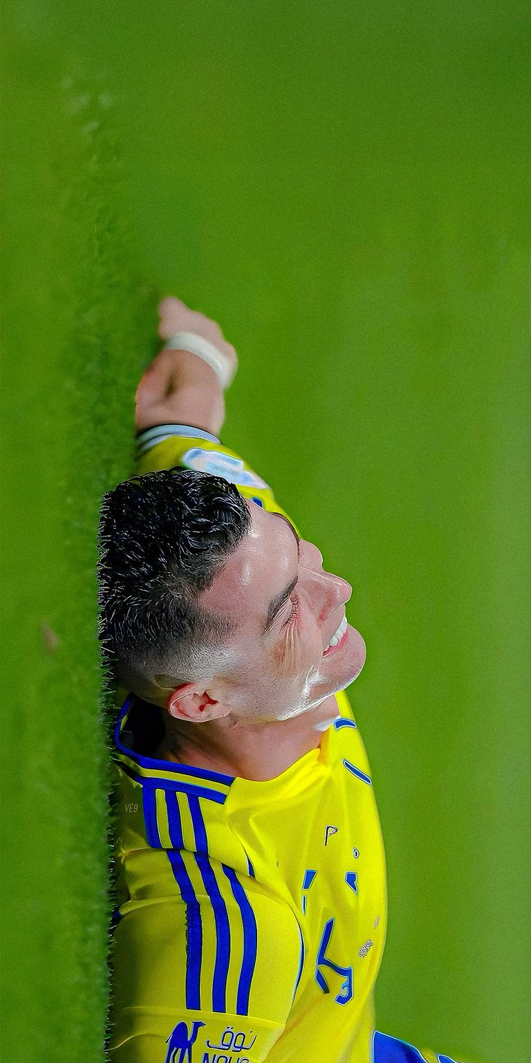 Cristiano Ronaldo lying in the field wallpaper