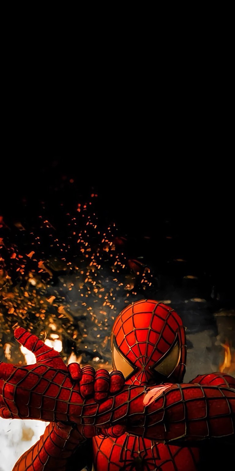 Download this amazing Spiderman wallpaper in 4K resolution for your iPhone! This stunning wallpaper features Spiderman with his arms crossed, set against a dark background with fiery embers.
