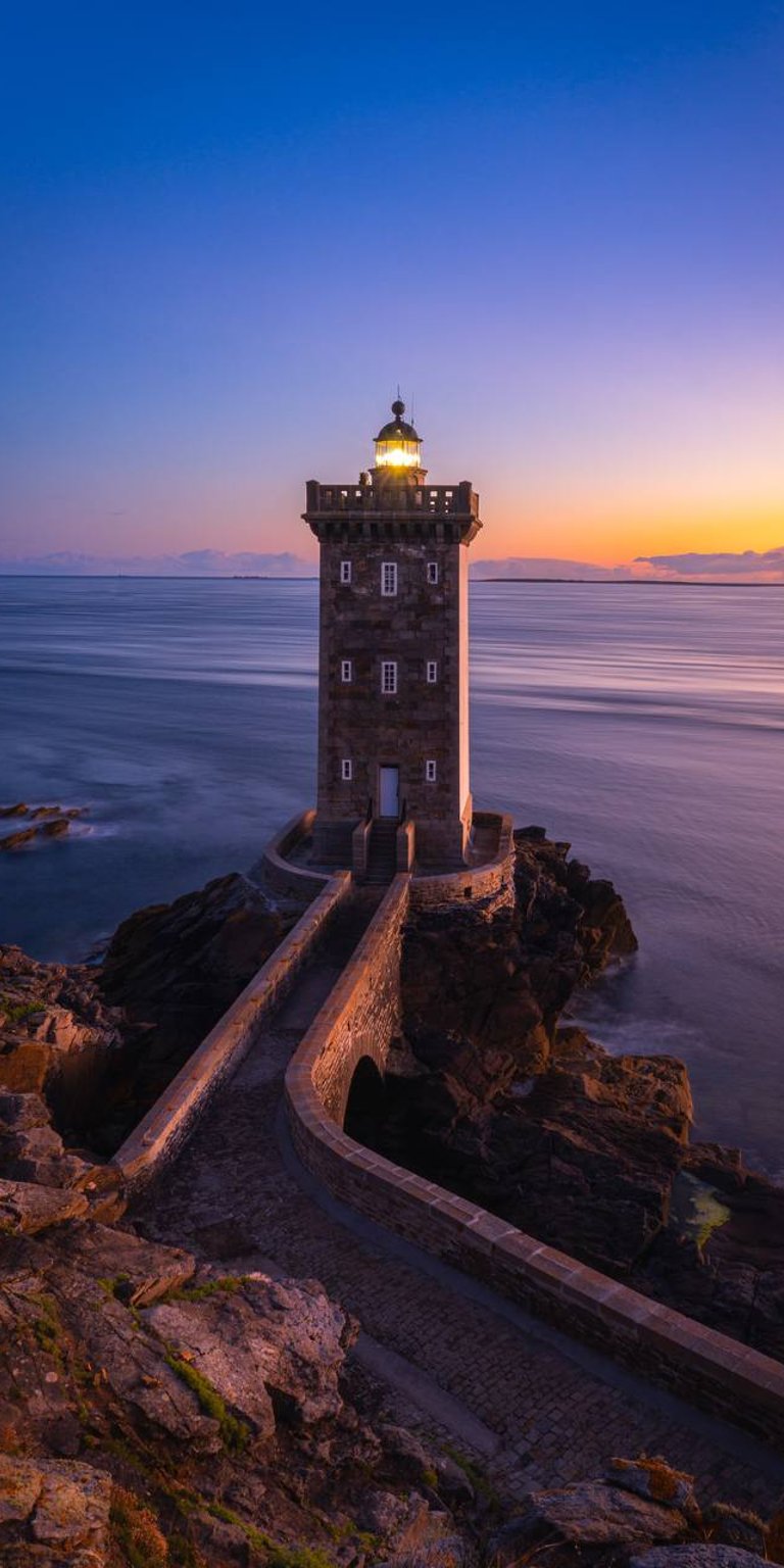 Light house at sunset wallpaper