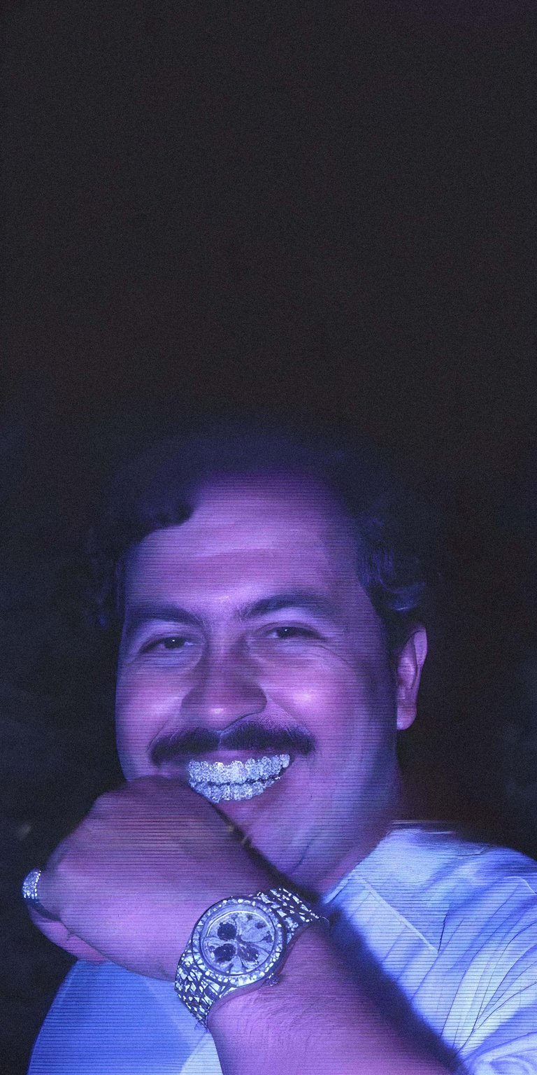 Get this Pablo Escobar wallpaper for your iPhone, showcasing his iced-out grill and diamond-studded watch in stunning 4K resolution. This wallpaper captures the notorious figure with an unforgettable smile and extravagant style.