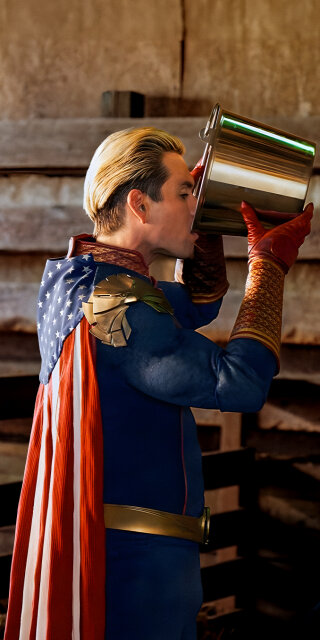 Homelander drinking water on a bucket wallpapers
