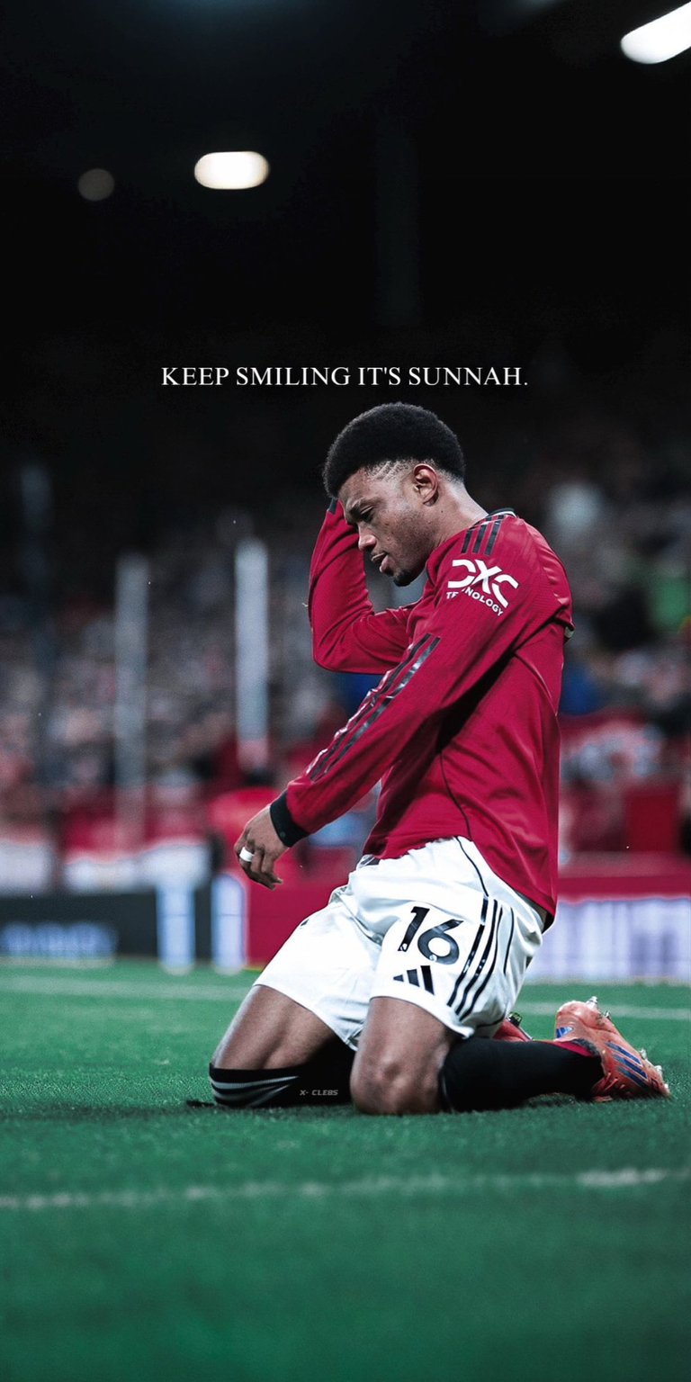 This high-quality wallpaper showcases Manchester United winger Amad Diallo on his knees in celebration. Above him, the text "KEEP SMILING IT'S SUNNAH" serves as a reminder of positive faith within the world of elite football. A great choice for Red Devils fans who value the intersection of sport and character.