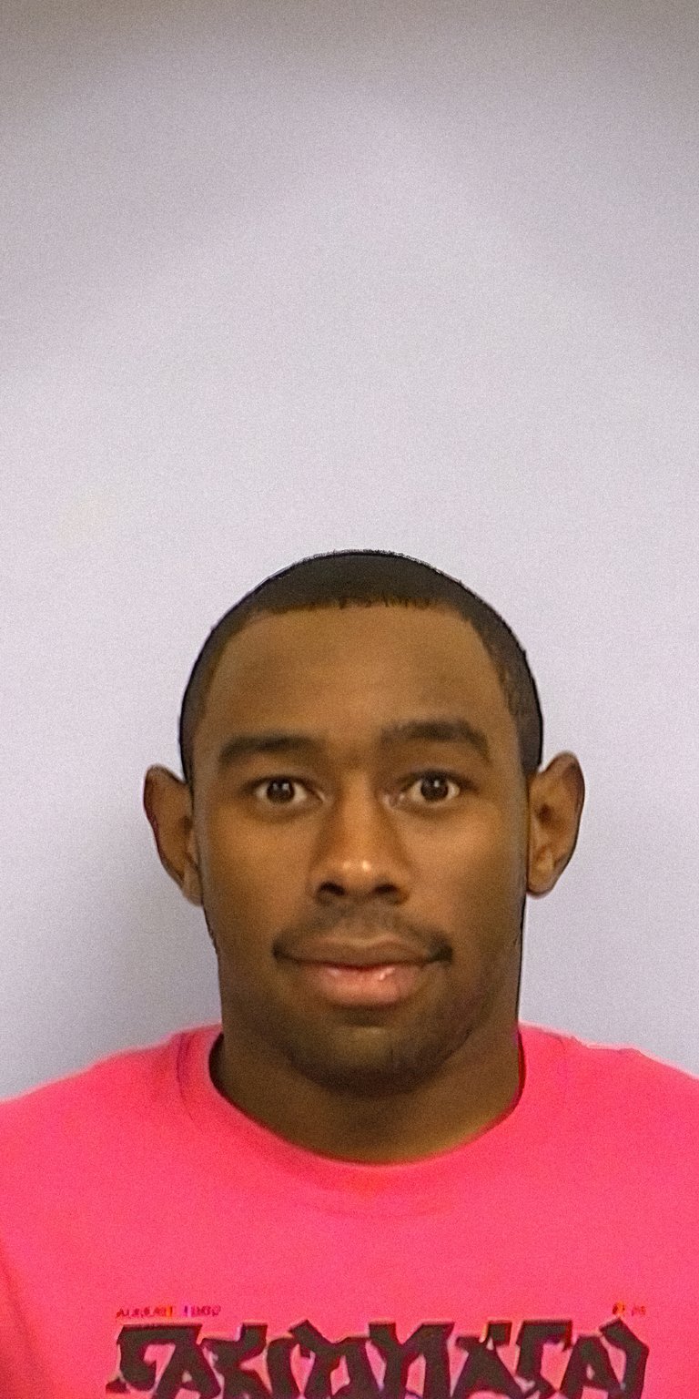 Tyler the creator mugshot wearing pink tshirt wallpapers