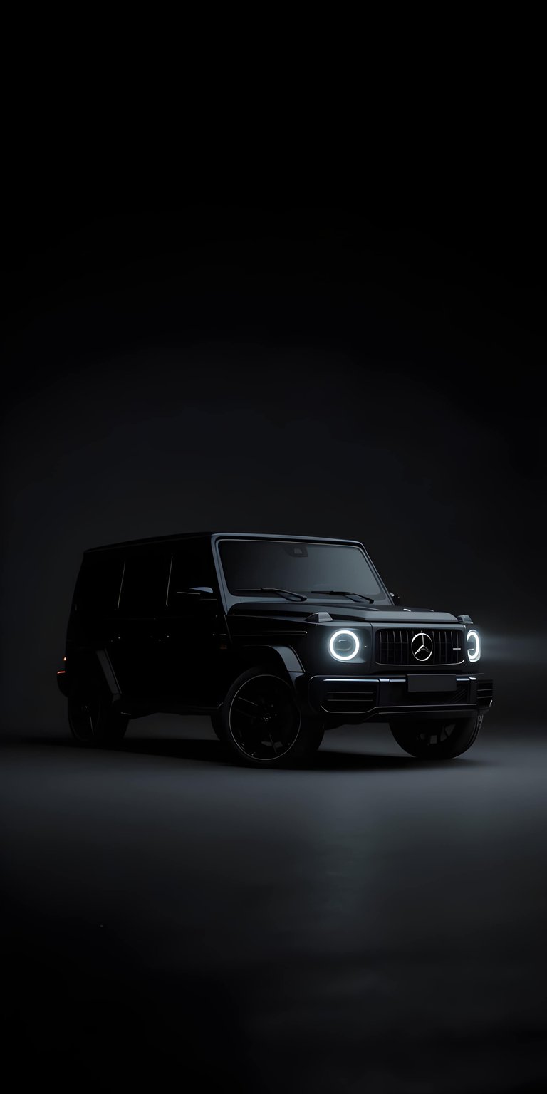 This stunning black Mercedes G-Class 4K wallpaper is designed specifically for iPhone users who love a high-contrast, premium look. Featuring a sleek OLED / AMOLED wallpaper aesthetic, the image highlights the iconic boxy silhouette and glowing LED ring headlights against a deep black background.
