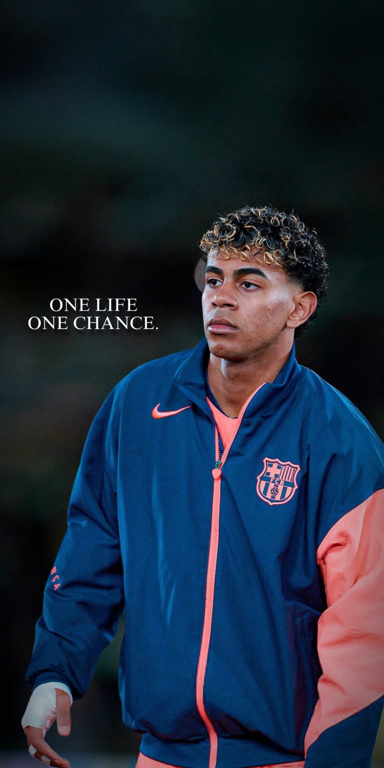 This Lamine Yamal 4K wallpaper features the rising football star in his FC Barcelona training gear, perfect for any fan's iPhone. This aesthetic wallpaper captures a focused mood with its deep blue and orange tones set against a soft, moody background.