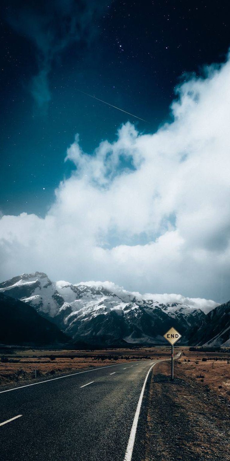 Road near mountain with clouds view wallpapers