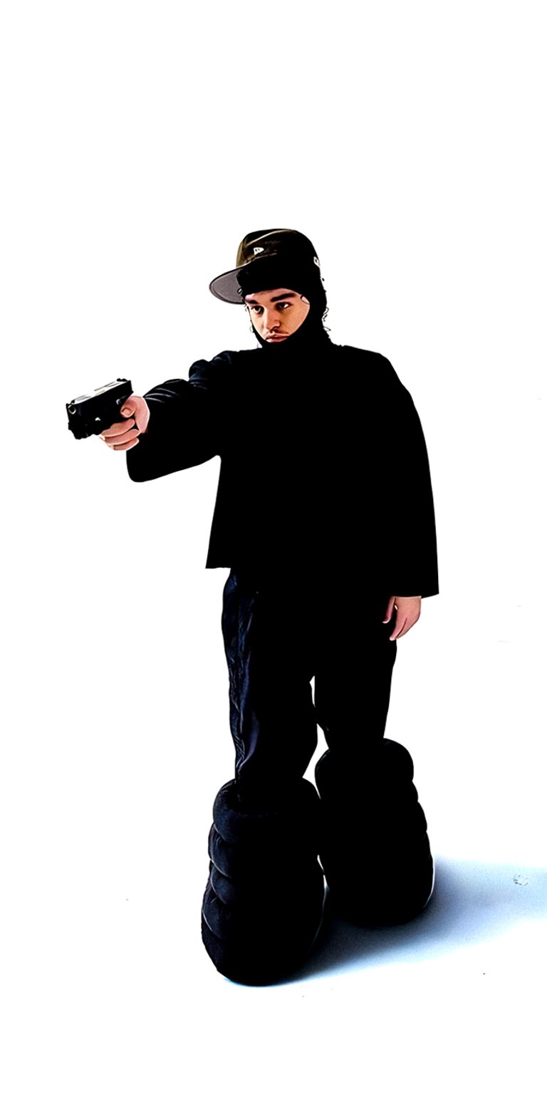 Yeat pointing a gun with white background wallpaper