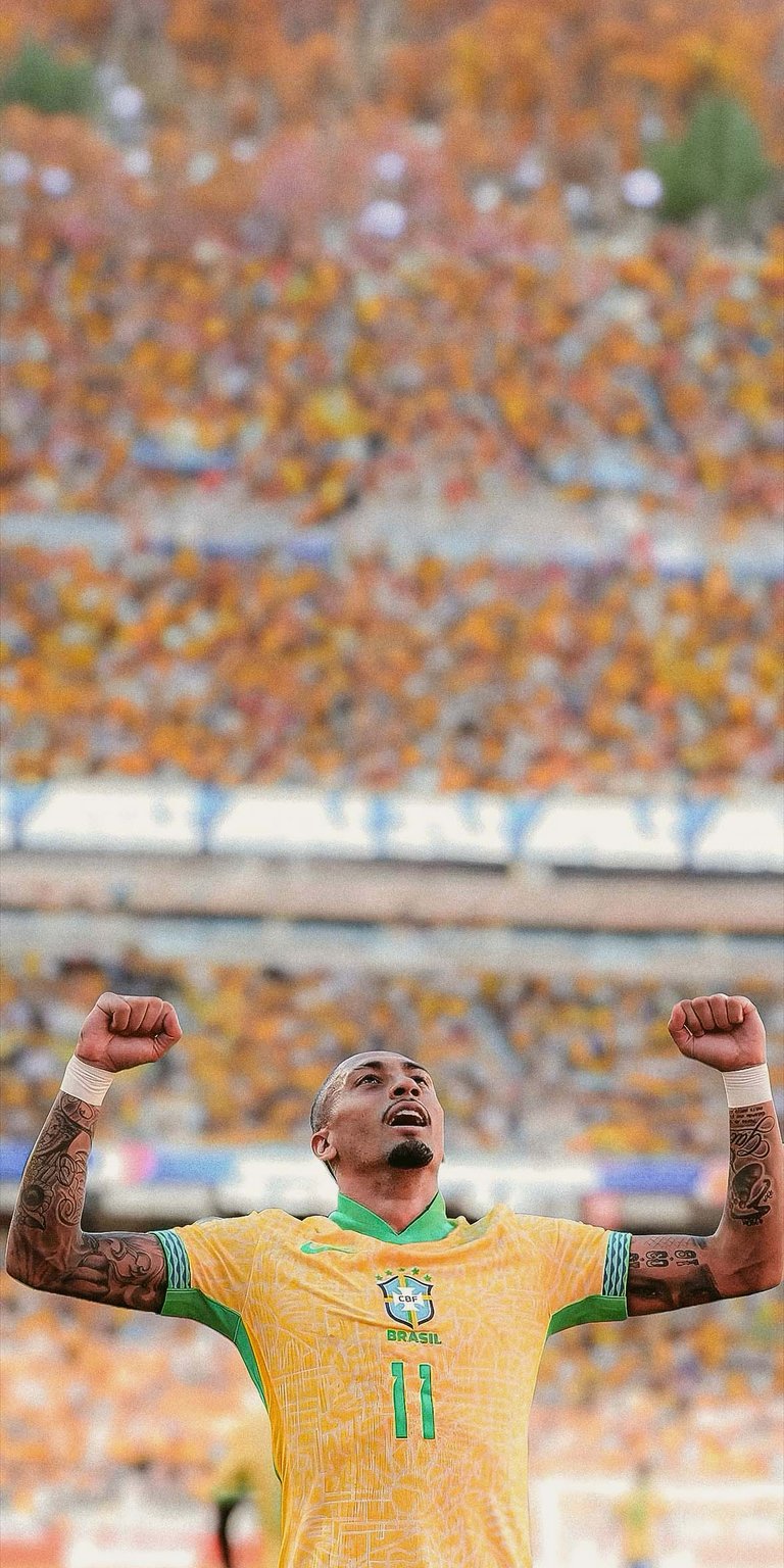 Rodrygo celebrating with the crowd wallpaper