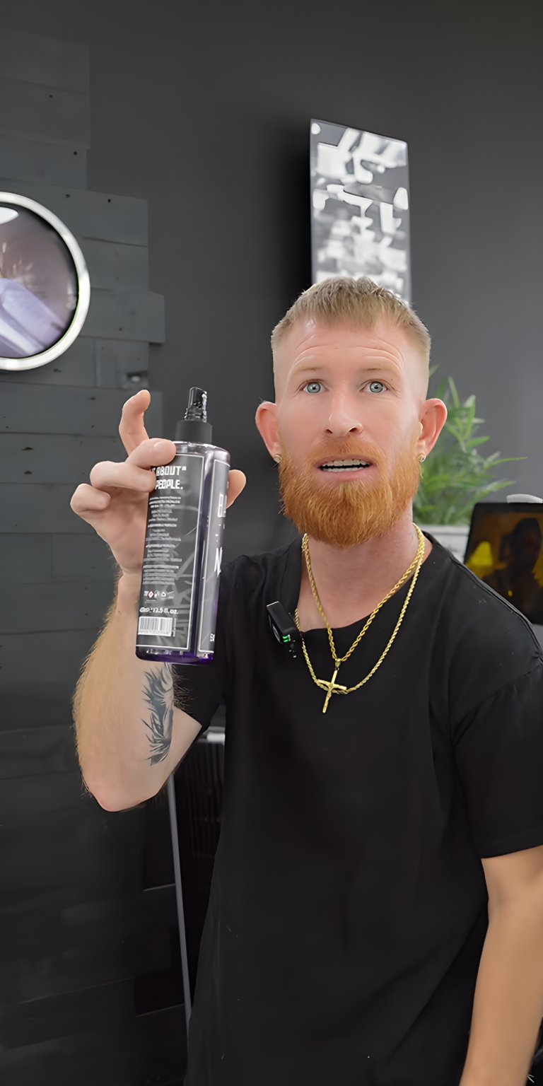 Man holding spray wallpaper for mobile