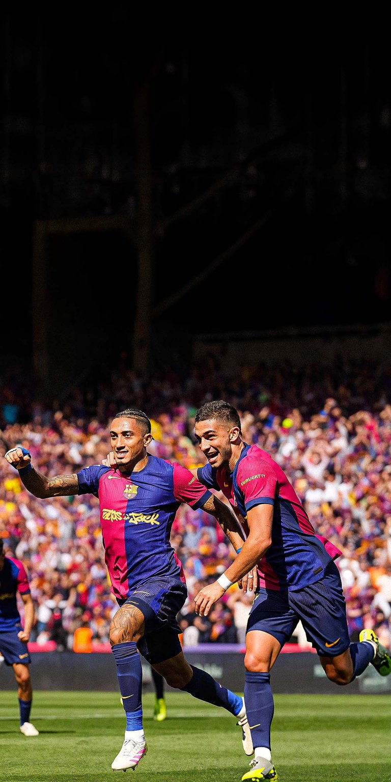 Raphinha of FC Barcelona celebrates scoring his team's third goal Wallpaper
