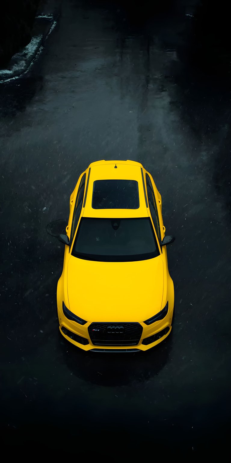 This 3D wallpaper captures a vibrant yellow Audi RS6 from a unique overhead perspective. It is a high-energy aesthetic wallpaper that adds a modern, sporty look to your iPhone.