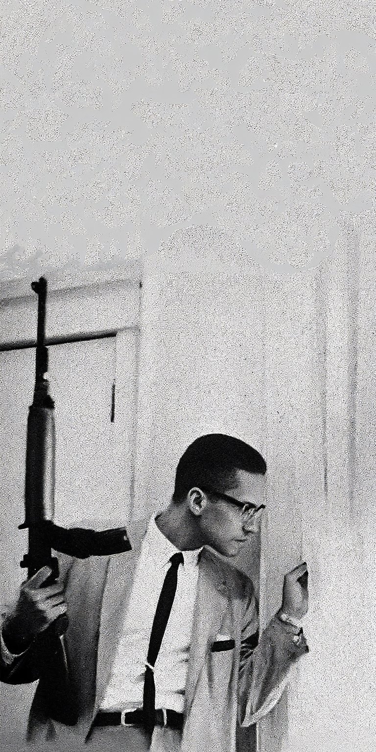 This monochrome wallpaper features the iconic image of Malcolm X looking out a window. Enhance your iPhone with this powerful and historical Aesthetic wallpaper.