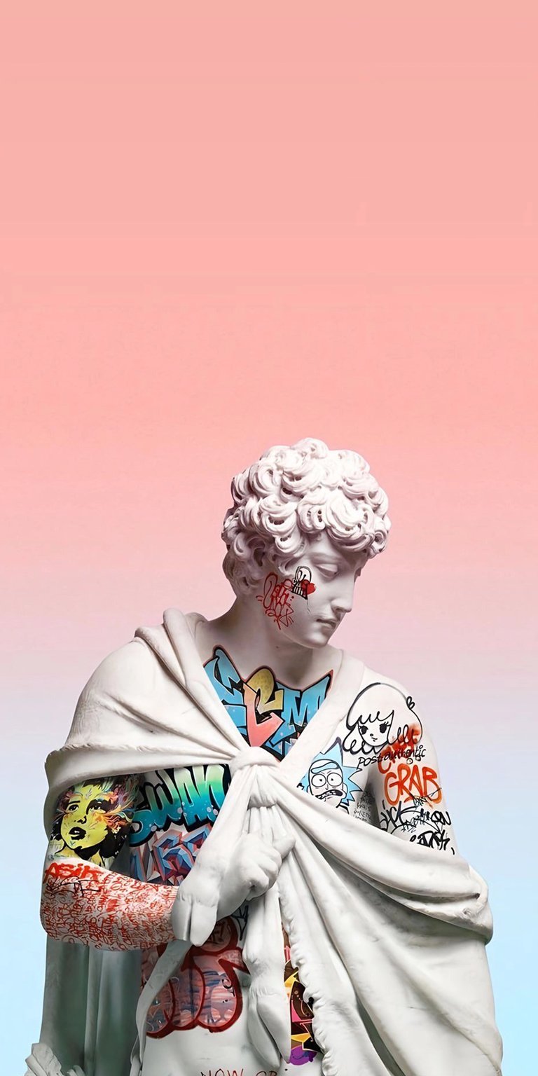 Get this unique Apollo statue 4K wallpaper for your iPhone! The artistic wallpaper features vibrant graffiti art covering the classical figure, including a 'Grab' tag and cartoon face.