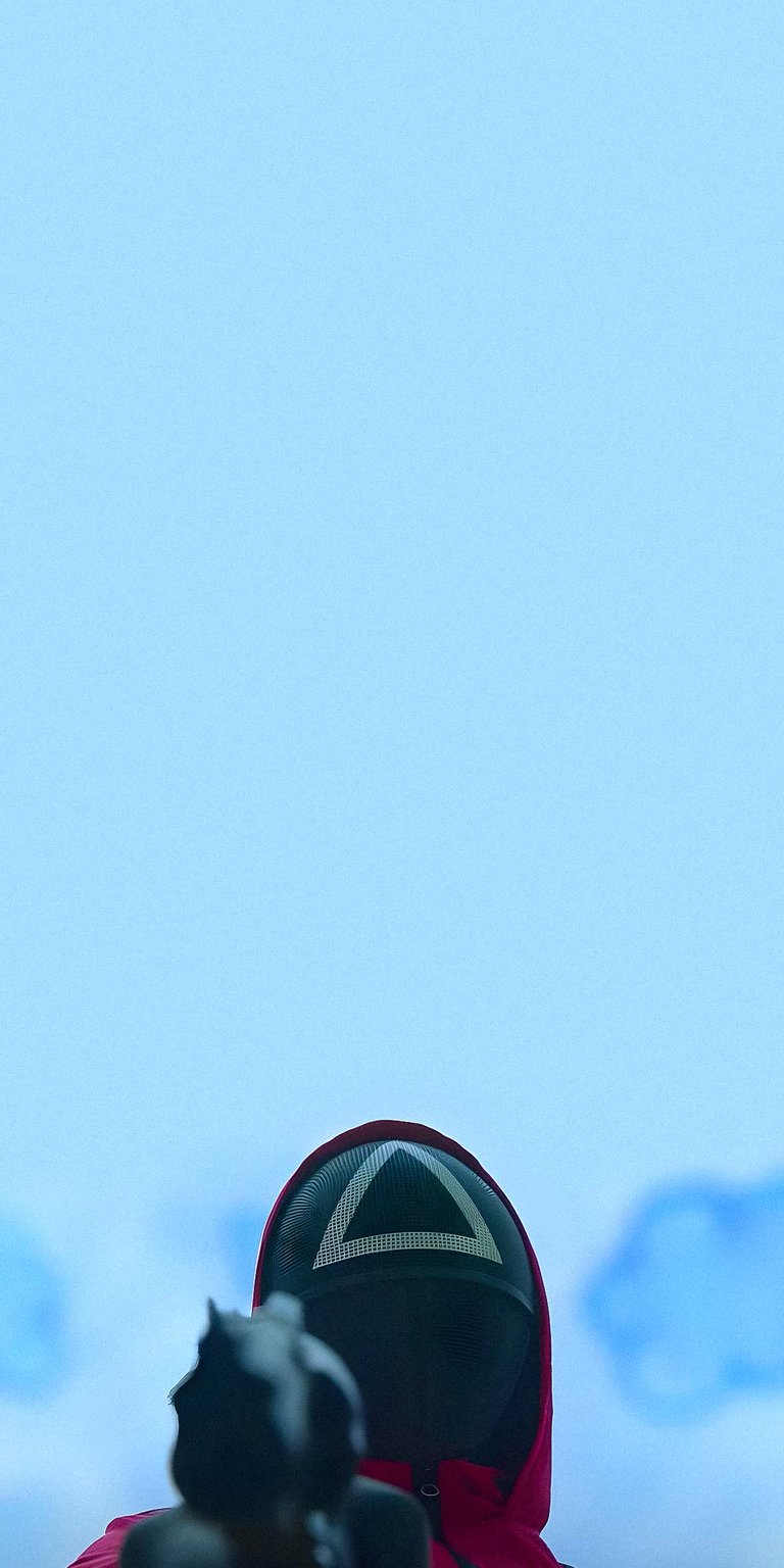 Squid Game Soldier Pointing Gun Wallpaper