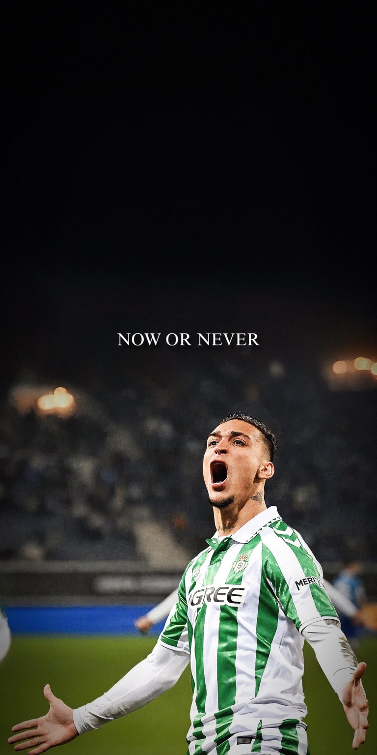 A dynamic 4K wallpaper featuring the Brazilian winger Antony during his time at Real Betis. The image showcases the distinctive green and white striped kit against a dark, moody background. The motivational "NOW OR NEVER" text adds a layer of intensity, making it a perfect high-resolution background for football enthusiasts.