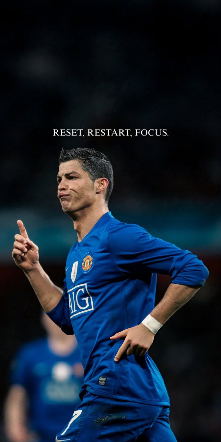 A stunning 4K live wallpaper showcasing the legendary Cristiano Ronaldo (CR7) in his iconic Manchester United blue kit. The motivational mantra "RESET, RESTART, FOCUS" is overlaid, reflecting the dedication and resilience of one of football's greatest players in a subtle, moving display. This high-definition, animated capture is an essential addition for any fan who values classic football greatness and powerful inspiration. Elevate your phone's screen with the energy of a true champion!
