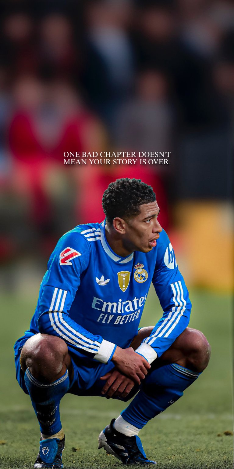 The image shows Jude Bellingham, a professional footballer for Real Madrid, in his team's blue away jersey 4k football wallpaper