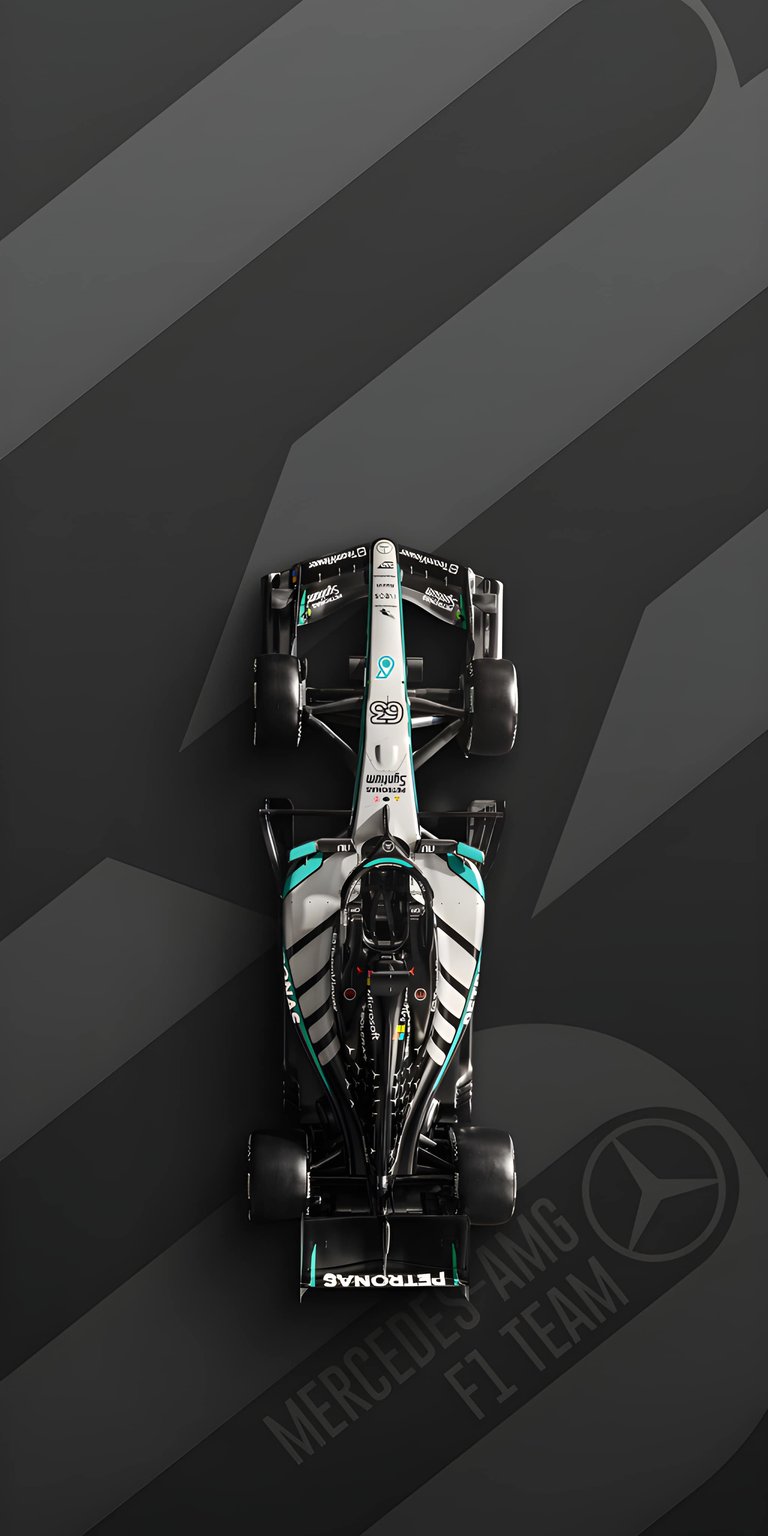 Mercedes F1 4K Wallpaper showcases a sleek Formula 1 race car with metallic silver detailing and aerodynamic design. This dynamic wallpaper adds speed, precision, and motorsport energy to your iPhone lock screen and home screen, perfect for aesthetic wallpapers.