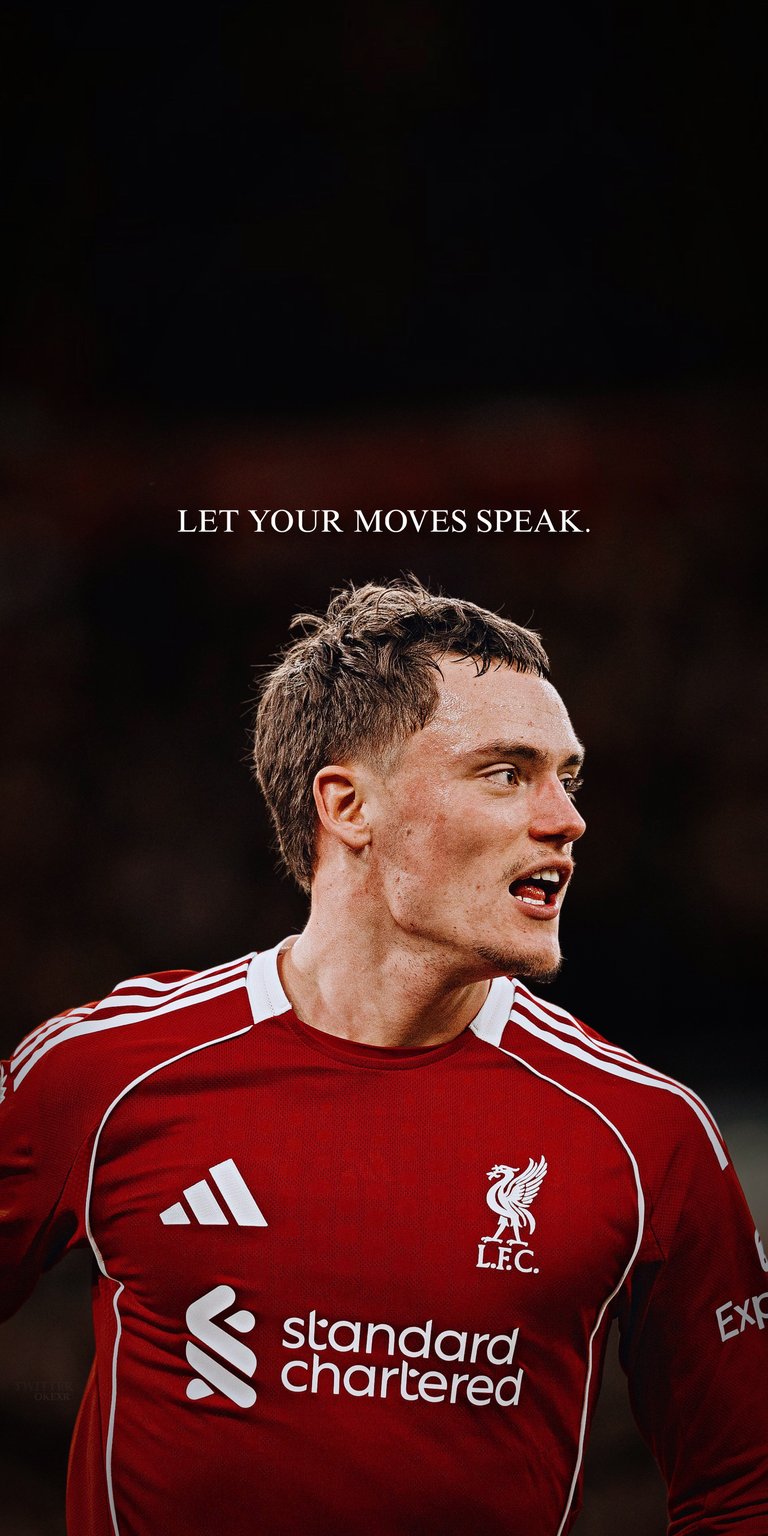 A high-quality 4K wallpaper of Florian Wirtz in a Liverpool FC kit edit. The German playmaker is shown looking off-camera with a focused gaze. The quote "LET YOUR MOVES SPEAK" is displayed in elegant serif typography, making this an ideal background for fans who appreciate technical skill and the "calm" side of the beautiful game.