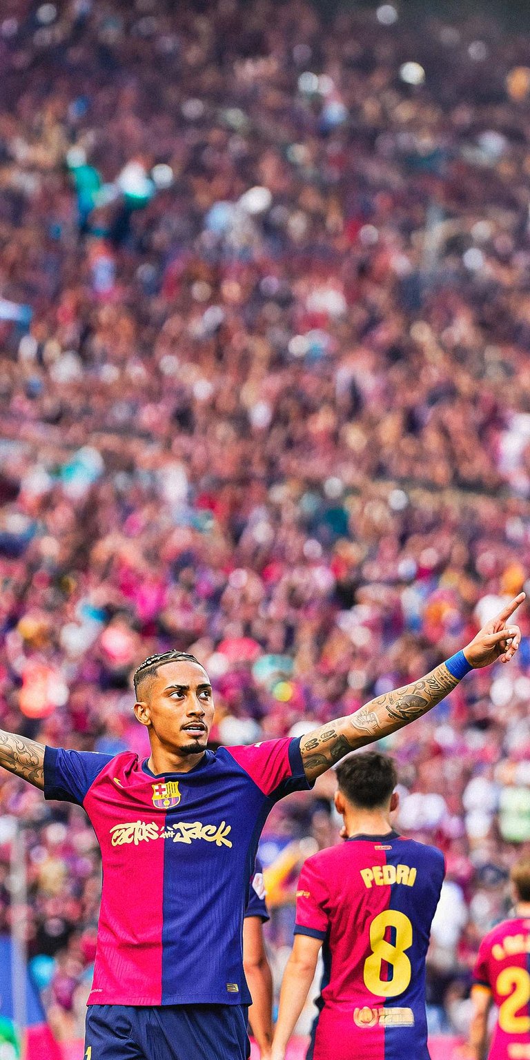 Raphinha of FC Barcelona celebrates scoring his team's fourth goal Wallpaper