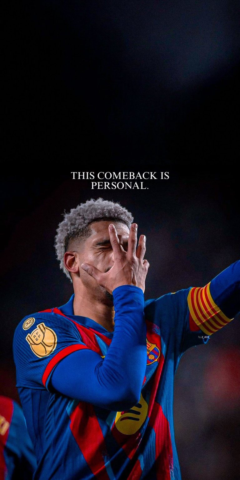 Download this high-quality Ronald Araújo 4K wallpaper featuring the intense "This Comeback Is Personal" typography. This entry in our OLED wallpapers collection for iPhone captures a dramatic mood with deep shadows and vibrant Blaugrana colors.