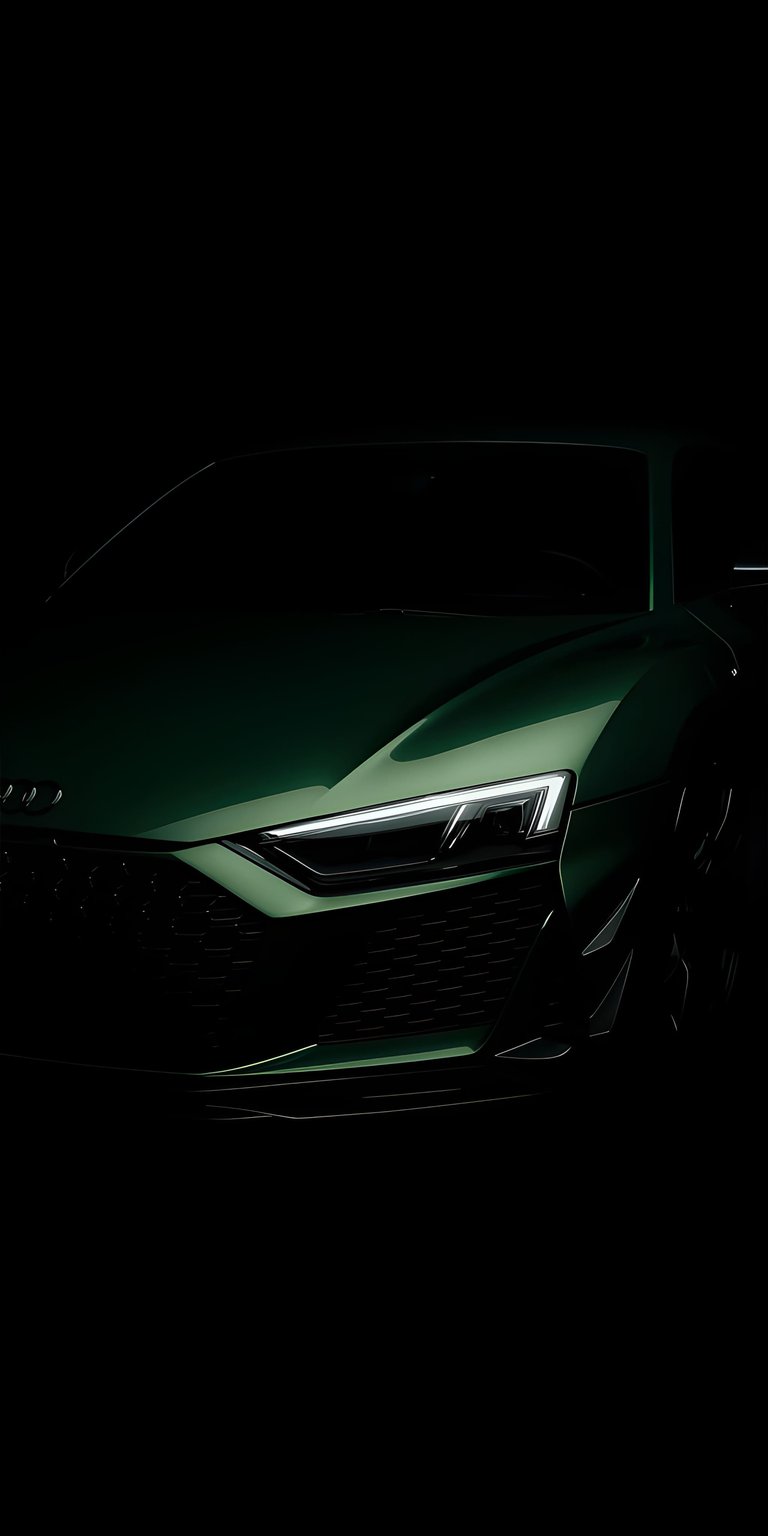 This high-contrast Audi R8 4K wallpaper features a deep emerald green finish emerging from a pure black background, perfect for iPhone screens. The minimalist composition of this OLED / AMOLED wallpaper highlights the sharp LED headlight design and aggressive front grille.