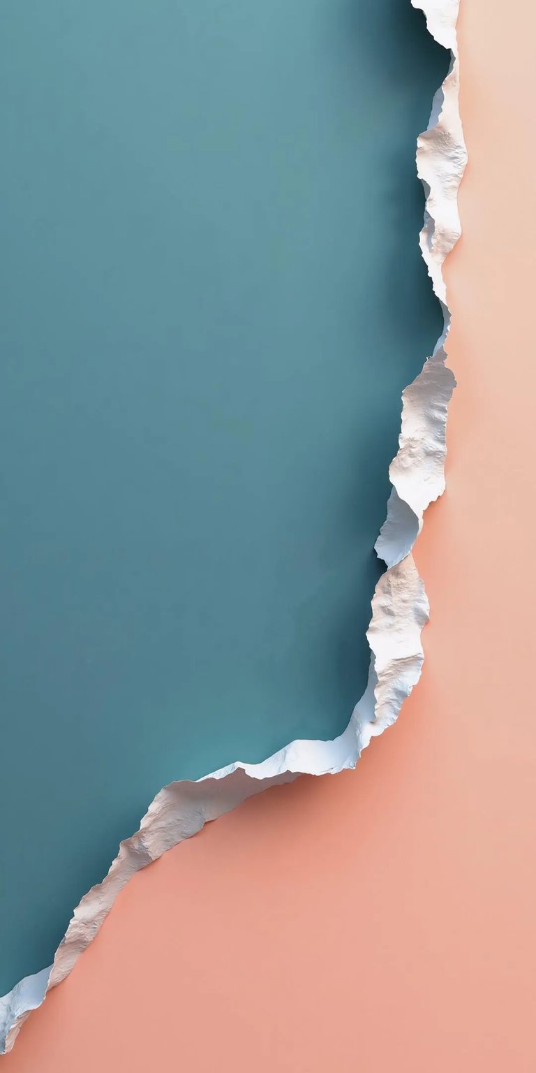 Download this eye-catching torn paper wallpaper for your iPhone in stunning 4K resolution. The wallpaper features a clean divide between teal and peach with a jagged, silver-lined tear.