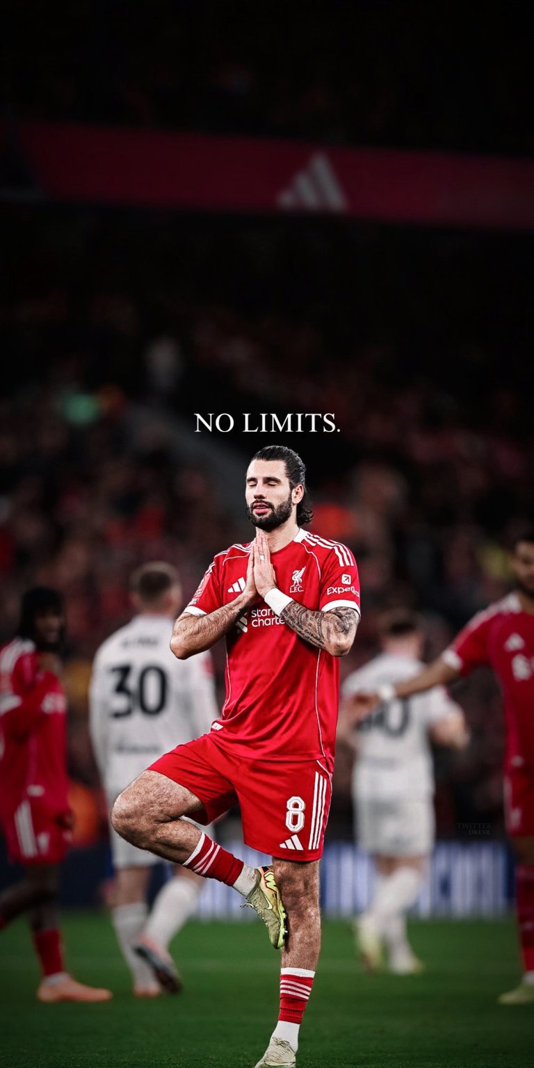 Elevate your screen with this Dominik Szoboszlai 4K wallpaper featuring the Liverpool midfielder in his iconic red kit. The wallpaper highlights his signature celebration stance and "No Limits" text, perfect for any iPhone user and Reds fan.