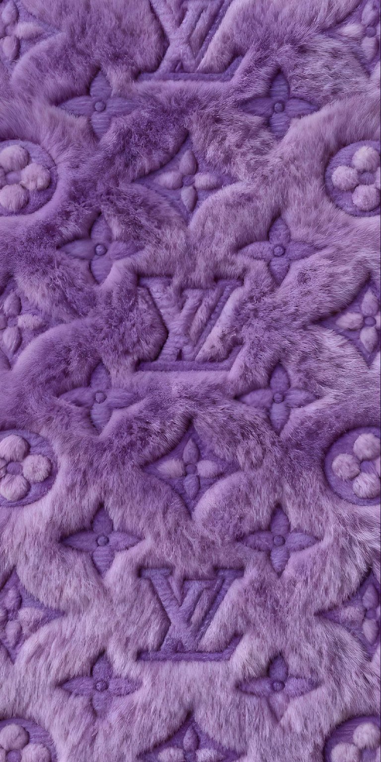 Vibrant and bold, this purple textured fur wallpaper brings a pop of 4K color to your iPhone. The rich violet fur wallpaper showcases a dense, wavy pile that looks incredibly soft and premium.