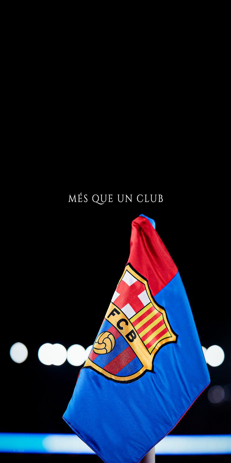 Download this stunning FC Barcelona 4K wallpaper for your iPhone, showing the club's vibrant flag against a sleek black backdrop and the iconic 'Més que un club' motto. This wallpaper captures the essence of FCB with its blue and red colors and the distinctive FCB crest.