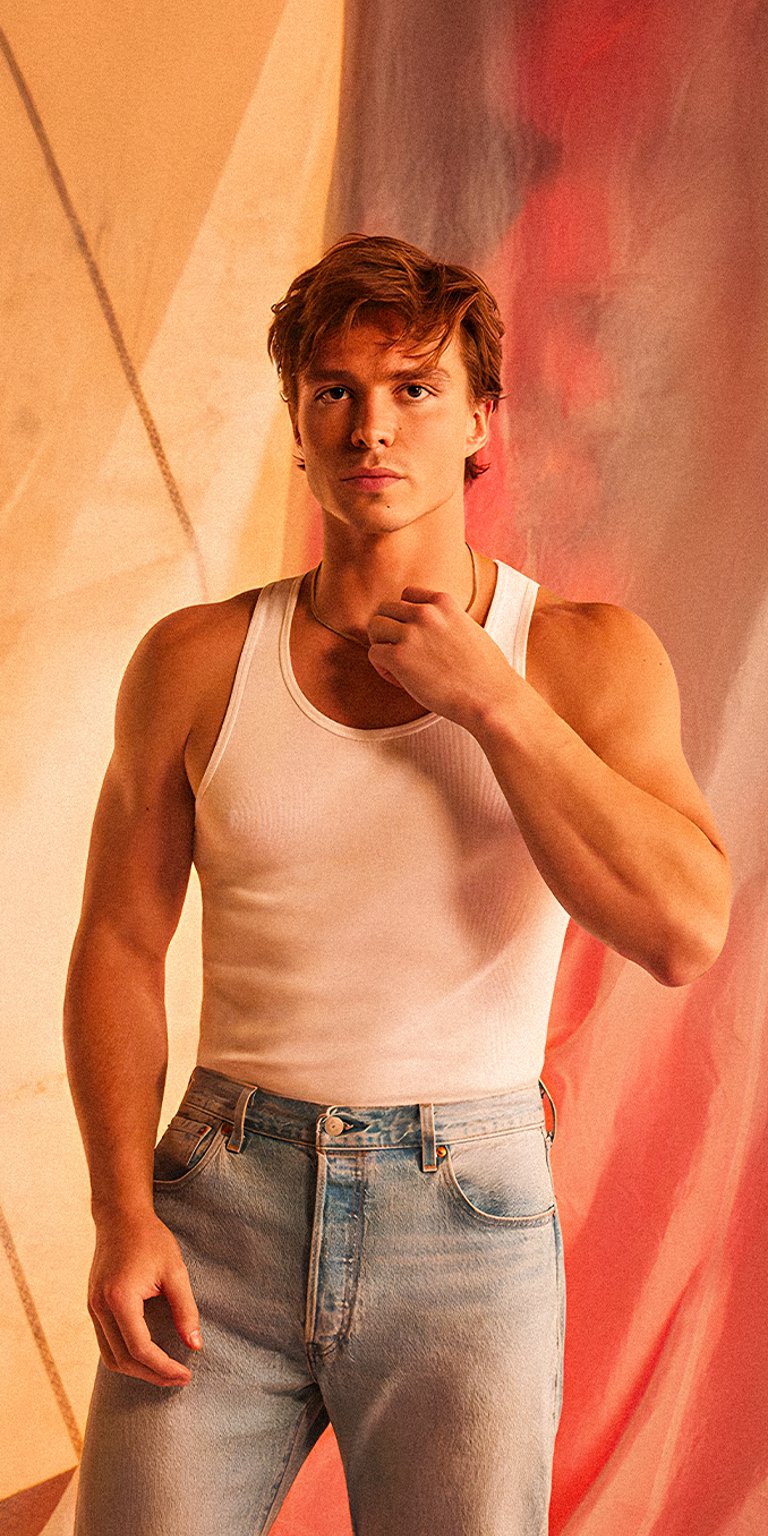 Lyle Menendez flexing muscles in a white sando wallpapers