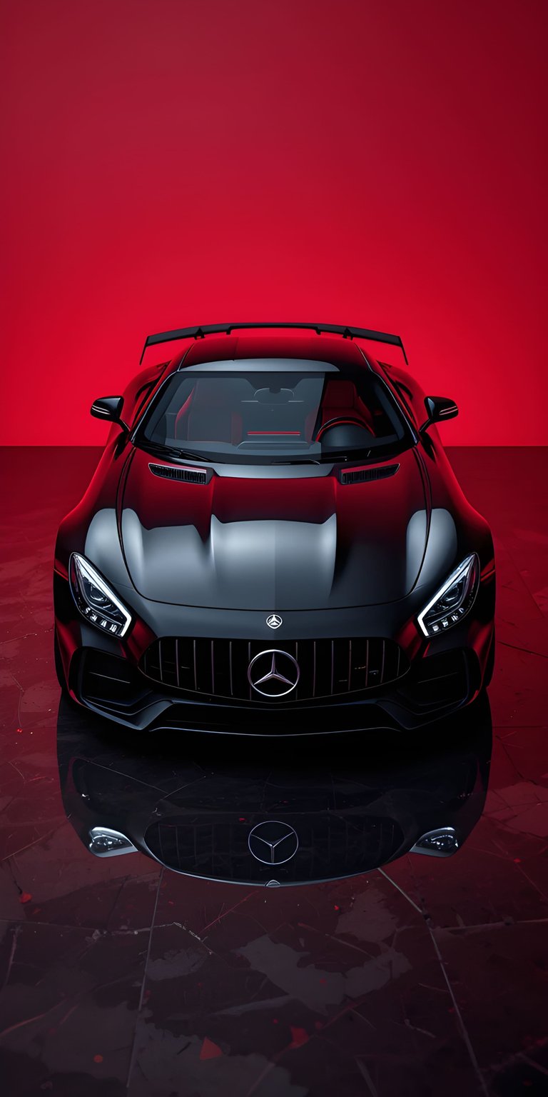 This high-contrast 4K wallpaper features a matte black Mercedes-AMG GT centered against a striking red backdrop. Perfect as an OLED / AMOLED wallpaper, this sleek visual brings a premium automotive aesthetic to your iPhone lock screen.