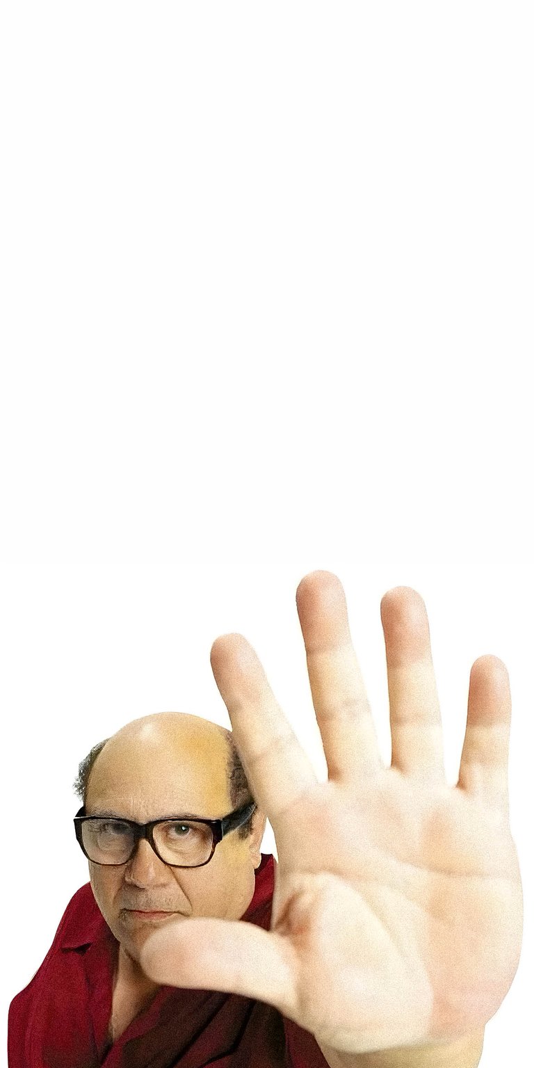Danny DeVito stop hand sign with white background wallpaper