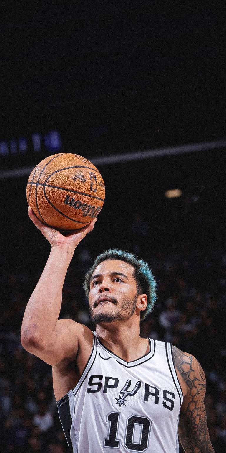 Jeremy Sochan shoots a free throw wallpaper iPhone