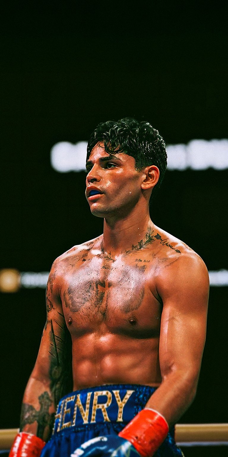 This is a picture of professional boxer Ryan Garcia. He is known for his fast hands and social media presence wallpaper iPhone 4K